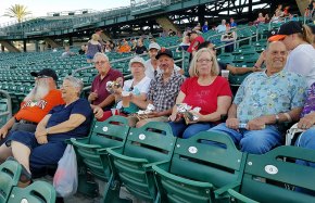 This rowdy bunch of fans cheer on the Grizzlies at Lemoore Night at Grizzlies Stadium Friday night, June 2